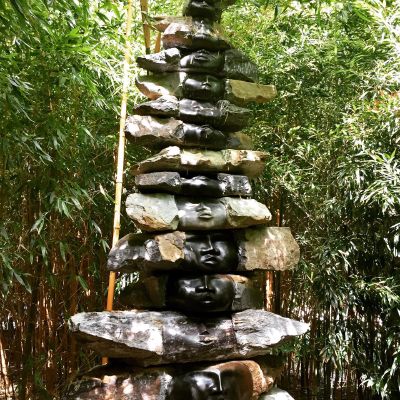 Rocky faces in a bambu canvas #Buddha #park #bambu #sculpture
