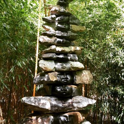 Rocky faces in a bambu canvas #Buddha #park #bambu #sculpture